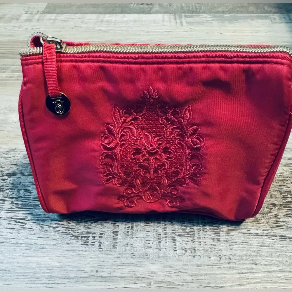 Victoria Secret Pink small satin cosmetic bag. With embroidered logo.